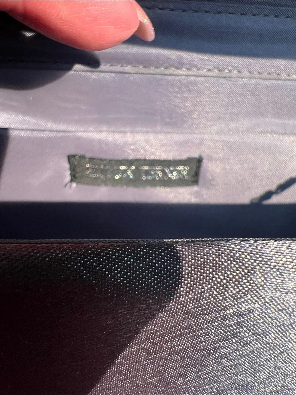 NWOT Gray Evening Clutch with clear crystal embellishment.